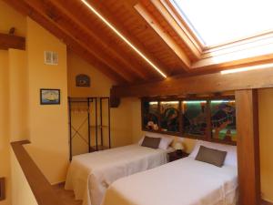 Postel nebo postele na pokoji v ubytování La casita de Chefy (Ajo) Nuevo chalet vacacional