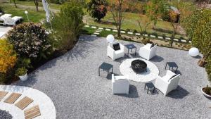 an aerial view of a patio with white furniture at Villa Lara in Marsaglia