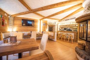 TV a/nebo společenská místnost v ubytování Hotel Capriolo