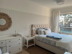 Posteľ alebo postele v izbe v ubytovaní Morski Apartament Hampton w Playa Baltis