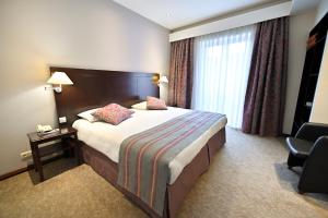 Letto o letti in una camera di Europe Hotel