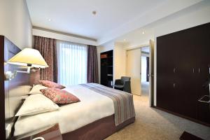 Letto o letti in una camera di Europe Hotel