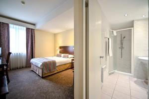 Letto o letti in una camera di Europe Hotel