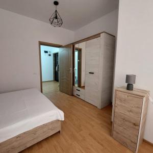 Giường trong phòng chung tại Rio Apartament
