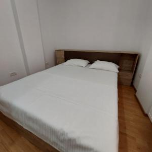 Giường trong phòng chung tại Rio Apartament