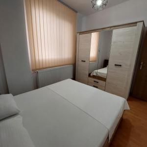 Giường trong phòng chung tại Rio Apartament
