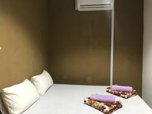 Katil atau katil-katil dalam bilik di Nusantara Mattwaddien Hostel