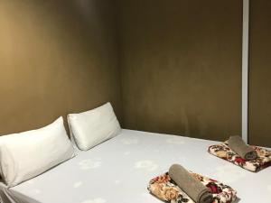 Katil atau katil-katil dalam bilik di Nusantara Mattwaddien Hostel
