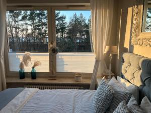 Posteľ alebo postele v izbe v ubytovaní Morski Apartament Hampton w Playa Baltis