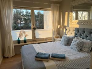 Posteľ alebo postele v izbe v ubytovaní Morski Apartament Hampton w Playa Baltis