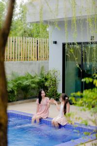 Πισίνα στο ή κοντά στο Rainforest Hotel by NSUN