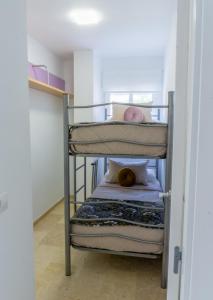 Posteľ alebo postele v izbe v ubytovaní Apartamento mediterráneo en pleno corazón de Moraira