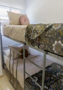 Posteľ alebo postele v izbe v ubytovaní Apartamento mediterráneo en pleno corazón de Moraira