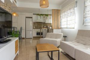 Kuchyňa alebo kuchynka v ubytovaní Apartamento mediterráneo en pleno corazón de Moraira