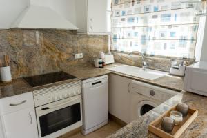 Kuchyňa alebo kuchynka v ubytovaní Apartamento mediterráneo en pleno corazón de Moraira