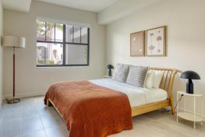 a bedroom with a bed and a window at Miramar 2BR w gym pool wd nr WF MIA-25 in Miramar +15 photos