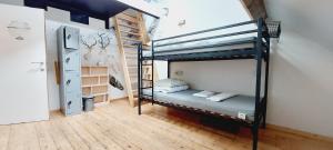 Voodi või voodid majutusasutuse KaBa Hostel toas