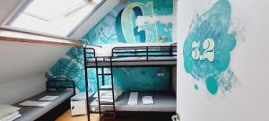 Voodi või voodid majutusasutuse KaBa Hostel toas
