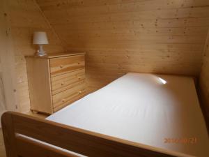 Postel nebo postele na pokoji v ubytování Zrubovy dom Silvia
