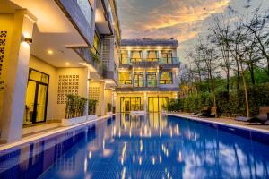 Πισίνα στο ή κοντά στο Rainforest Hotel by NSUN