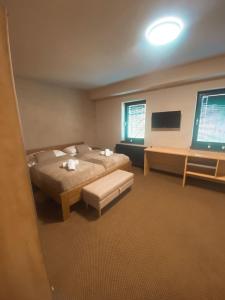 TV a/nebo společenská místnost v ubytování hotel Nautilus