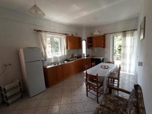Kuchyň nebo kuchyňský kout v ubytování Happy Days Apartment