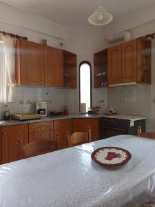 Kuchyň nebo kuchyňský kout v ubytování Happy Days Apartment