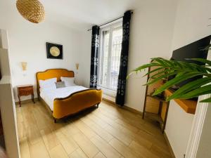 Posteľ alebo postele v izbe v ubytovaní Les appartements du village