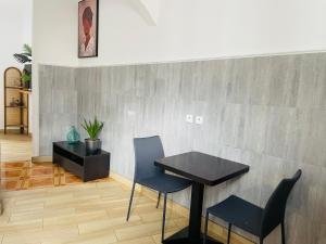 Posedenie v ubytovaní Les appartements du village