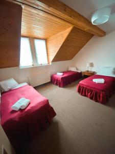 Postel nebo postele na pokoji v ubytování hotel Nautilus