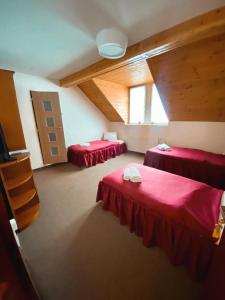 Postel nebo postele na pokoji v ubytování hotel Nautilus