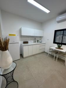 Köök või kööginurk majutusasutuses צימר פסטורלי בהגושרים +4 fotot