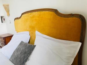 Posteľ alebo postele v izbe v ubytovaní Les appartements du village
