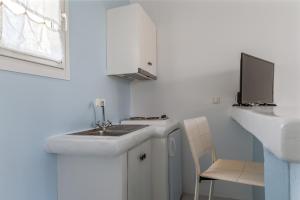 A kitchen or kitchenette at Ninemia Suites Tinos Superior 102