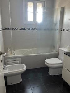 Kúpeľňa v ubytovaní ático con terraza- solarium