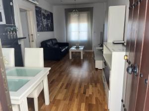 Kuchyňa alebo kuchynka v ubytovaní ático con terraza- solarium