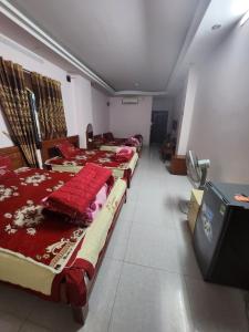 Letto o letti in una camera di Ruby Hostel Hà Giang