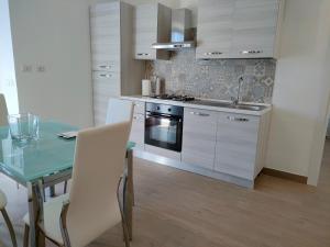 Kuchyň nebo kuchyňský kout v ubytování Villa Lante Viterbo Apartment