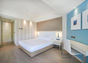 Postel nebo postele na pokoji v ubytování RMH Lopud Lafodia Resort & Wellness