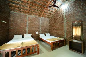 Afbeelding uit fotogalerij van Prakruth Backwater Stay By Lazo , Coorg in Suntikoppa