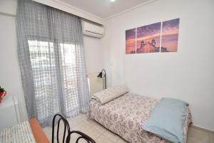 Posteľ alebo postele v izbe v ubytovaní Central Apartment Thessaloniki-Easy Parking