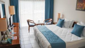Katil atau katil-katil dalam bilik di Happy Hotel Kalkan