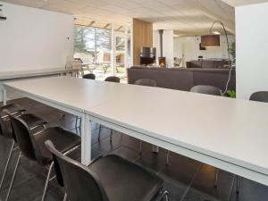 a conference room with a large table and chairs at Luxury Retreat in Vorupor - By Traum Ferienwohnungen in Snedsted +62 photos