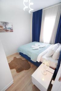 Postel nebo postele na pokoji v ubytování Classic Suite BH13