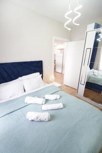 Postel nebo postele na pokoji v ubytování Classic Suite BH13