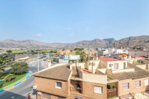 a view of a city with mountains in the background at La Gimena in Orihuela