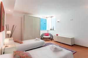 Postel nebo postele na pokoji v ubytování Villa Aroeira II + 24 fotografií