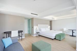 Postel nebo postele na pokoji v ubytování RMH Lopud Lafodia Resort & Wellness
