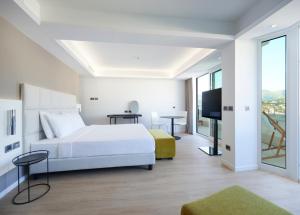 Postel nebo postele na pokoji v ubytování RMH Lopud Lafodia Resort & Wellness