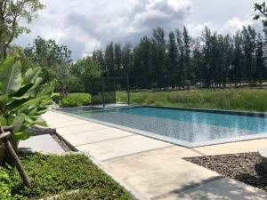 Πισίνα στο ή κοντά στο Cassia Residence Laguna Phuket Holiday Rental Apartment, Bang Tao Beach